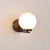 Image de Applique Sdb 1 Lumière Base Ronde En Métal Noir