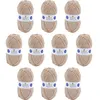 Image de 10 pelotes - 100% acrylique - Beige - 964 - 50g - 140m - DMC - Knitty 4 - Tricot