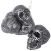 Image de 4 crânes métallisés décoratifs 12cm gris - générique 23627