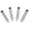 Image de 4 seringues graduées plastique 12cm 20ml - ptitclown 44044