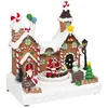Image de Village Noël lumineux maison pain d'épice avec enfants musical et animé
