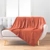 Image de Plaid flanelle relief unie Nelia terracotta 125x150