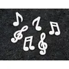 Image de Notes de musique en bois couleur blanc