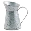 Image de cruche à lait contenant 7 x 10 cm