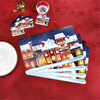 Image de 4 sets + 4 dessous de verres Noël sous la neige
