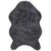 Image de Tapis imitation fourrure poil fin 60x90 cm gris
