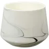 Image de The Home Deco Factory - Bougie parfumée effet marbré 10.5 cm Blanc - senteur Orchidée blanche