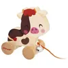 Image de Petite vache en bois a promener