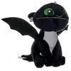 Image de Peluche dragons : bébé dragon noir vifagile 37 cm yeux vert - peluche licence dragons - doudou enfant