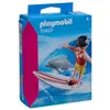 Image de Surfeuse avec un dauphin