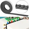 Image de Infactory : Bande adhésive 1 m pour briques de construction - Noir