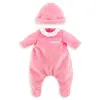 Image de Pyjama rose et bonnet pour poupon 30 cm