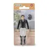 Image de Collecta Eine professionelle Jockeyin mit einem hellen Reithelm