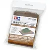 Image de Tamiya, Modelage, Enduit de lissage. Sol argileux/brun 150g Dio.