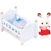 Image de Sylvanian Families Bébé lapin en chocolat avec son lit de camp