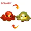 Image de Peluche poulpe BOLAKER® Peluches avec lumières LED Jaune et orange