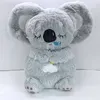Image de Peluche Koala SZSMART HXBTKL1 avec lumière et musique pour endormir les enfants - Gris