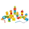 Image de Hape perles attachées String Along Shapes 30-pièces