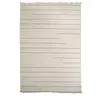 Image de tapis grand salon 250x350 fait main en laine beige rectangle motif simple NIMBUS