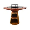 Image de Barbecue rond avec plaque de cuisson et de gril en acier et planche en bois PURLINE EFP59CO WOOD Marron