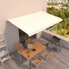 Image de vidaXL Luifel handmatig uittrekbaar 500x300 cm cràmekleurig3068937