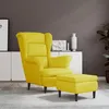 Image de Fauteuil à oreilles avec tabouret jaune moutarde velours