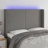 Image de vidaXL Hoofdbord LED 147x16x118/128 cm stof donkergrijs3123767