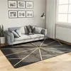 Image de vidaXL Vloerkleed wasbaar anti-slip 160x230 cm zwart en goudkleurig136618