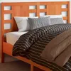 Image de vidaXL Tête de lit cire marron 135 cm bois massif de pin 844333