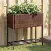 Image de Jardinière avec étagère marron résine tressée