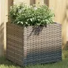 Image de Jardinière gris 36x30x32 cm résine tressée
