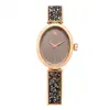 Image de Montre Swarovski Crystal Rock Série Ovale Mouvement Quartz Bracelet Métal Cadran Marron Résistante à l'eau 50m Montres Femmes 5656857 Brown Watch Dial