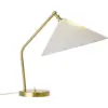 Image de Lampe de bureau en laiton et tissu beige Gräshoppa - Gubi