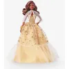 Image de Barbie-Barbie Joyeux NoÃ«l 2023-PoupÃ©e Robe DorÃ©e et Cheveux Bruns