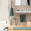 Image de Tapis de bain uni en coton fougÃ¨re 54 x 110