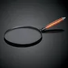 Image de Staub Fonte - 1212823 - CrÃªpiÃ¨re - Noir - Manche Bois - 28 Cm