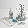 Image de Coffret Naissance (Egoutte Biberon Arbre Grey / Boite Doseuses Light/Dark Mist / Goupillon Silicone / Bavoir Tissu Tropical)