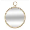 Image de Miroir mural en Rotin forme gousset D 38 cm