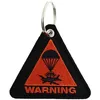 Image de Porte clé Clj Charles Le Jeune  Porte-clés Avion Parachute Warning - Triangle orange P28678517