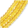Image de Perles de Bohème sur Fil - Facettées Jaune Transparent 6 x 8 mm