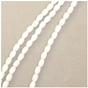 Image de Perles de Bohème sur Fil - Olive Facettée 6 x 4 mm Blanc Opaque
