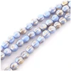 Image de Perles de Bohème sur Fil - Rondes Striées 6 mm Bleu Pastel Doré