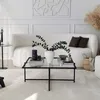 Image de Table basse design noire en verre LIMP