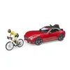 Image de VOITURE BRUDER ROADSTER AVEC PORTE VELO, UN VELO DE ROUTE ET UNE CYCLISTE