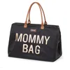 Image de Sac Ã Langer Mommy Bag Black Gold - Child Wheels