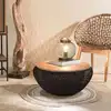 Image de Sixtine - table basse ronde diam65 plateau bois teck recyclé rotin noir