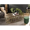 Image de Johan - table basse ovale 150x60cm aluminium doré piètement graphique