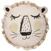 Image de Coussin rond lion franges 38 cm