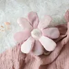 Image de Peluche musicale fleur en coton bio rose