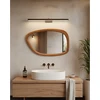 Image de Quadra - miroir organique en bois massif de manguier
